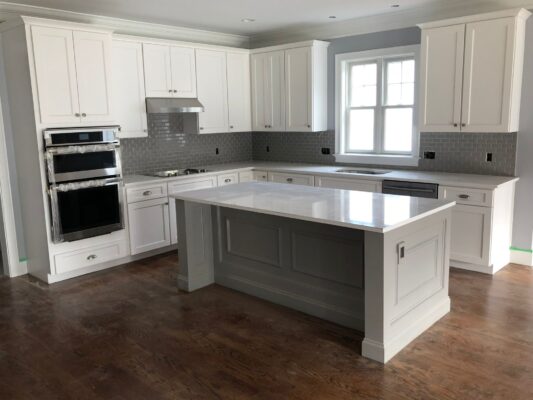 Infinity Stone Craft team assisting client with quartz countertop selection in Kissimmee
